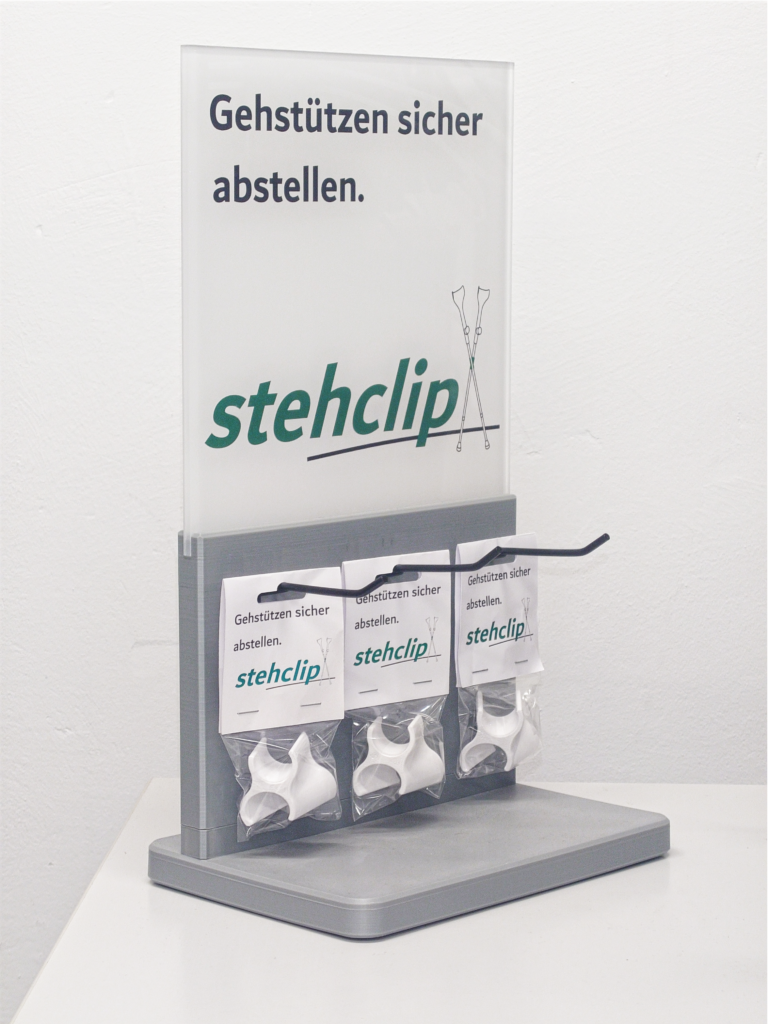 Start 6 Verkaufsaufsteller 3d-gedruckt mit Werbefläche "Stehclip - Gehstützen sicher abstellen" Beschriftung